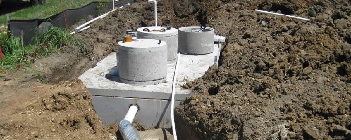 Septic system repair and installation site with tank access ports in Redding, CA